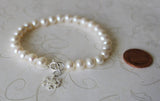 Fresh water pearl and snowflake charm bracelet, pearl bracelet, bridesmaids bracelet, snowflake bracelet, Christmas gift, Winter wedding